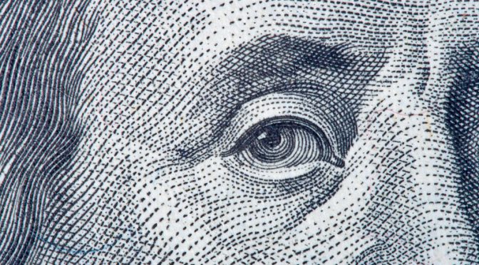 Benjamin Franklin close-up from one hundred dollars bill