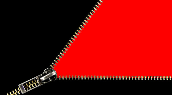 Zipper opening on a black and red background